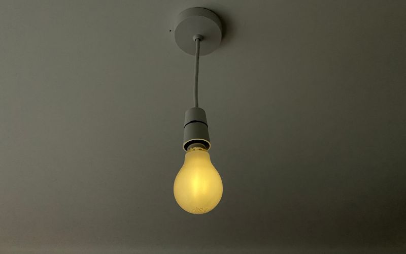 dimmed light bulb on ceiling